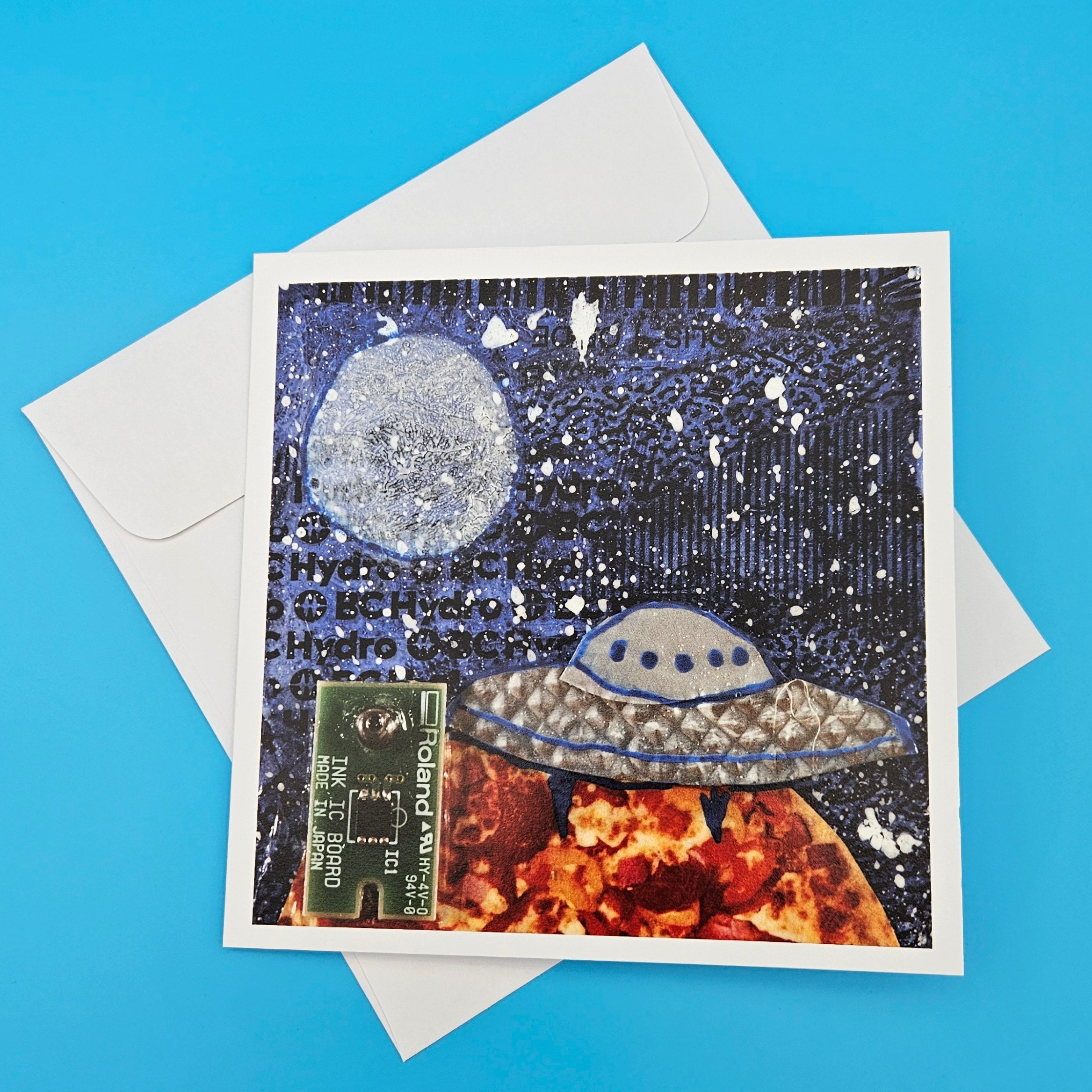 Greeting card with space-themed design featuring planets and UFO