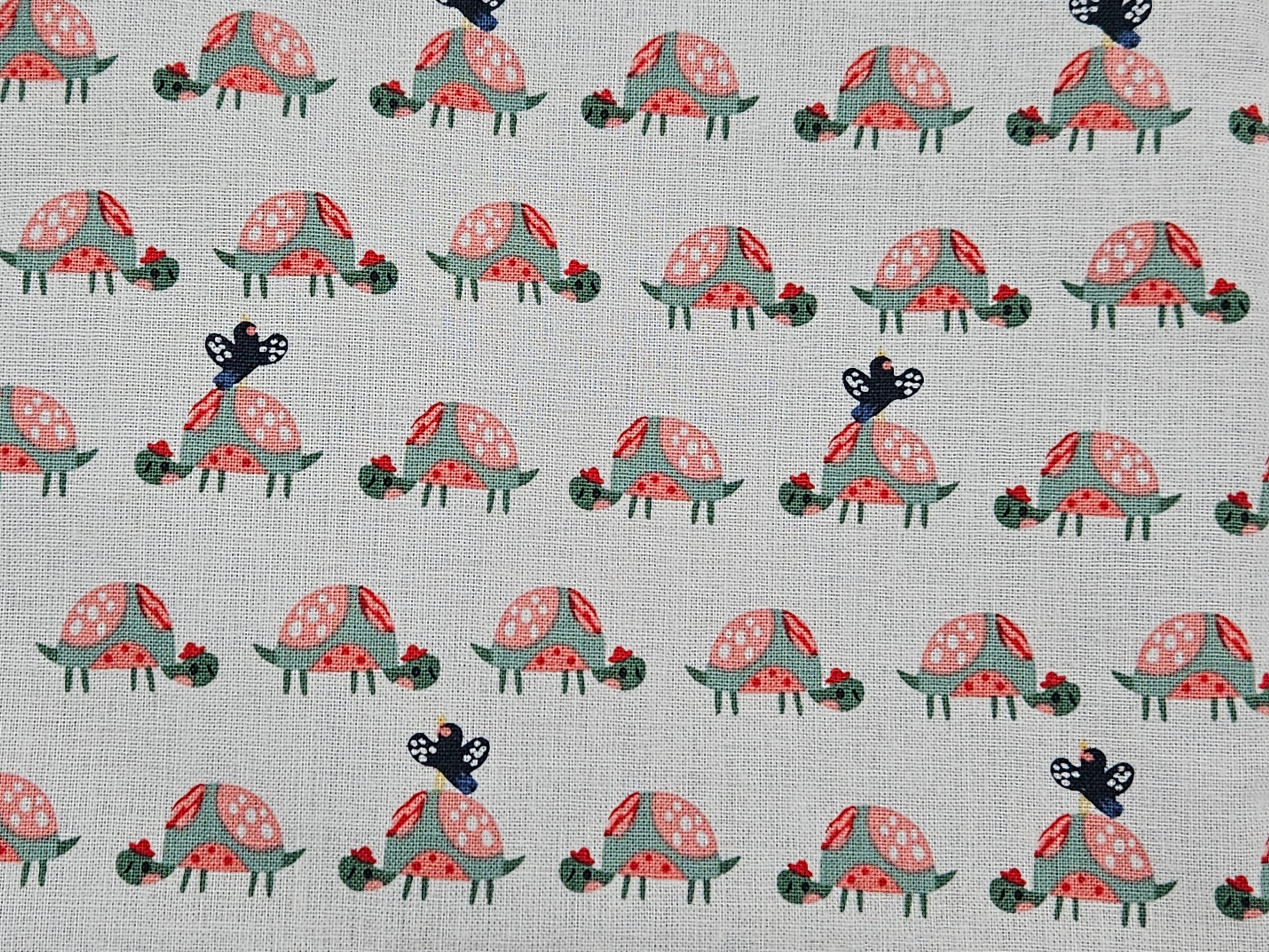 Pattern of tortoises with decorative elements on a light gray background