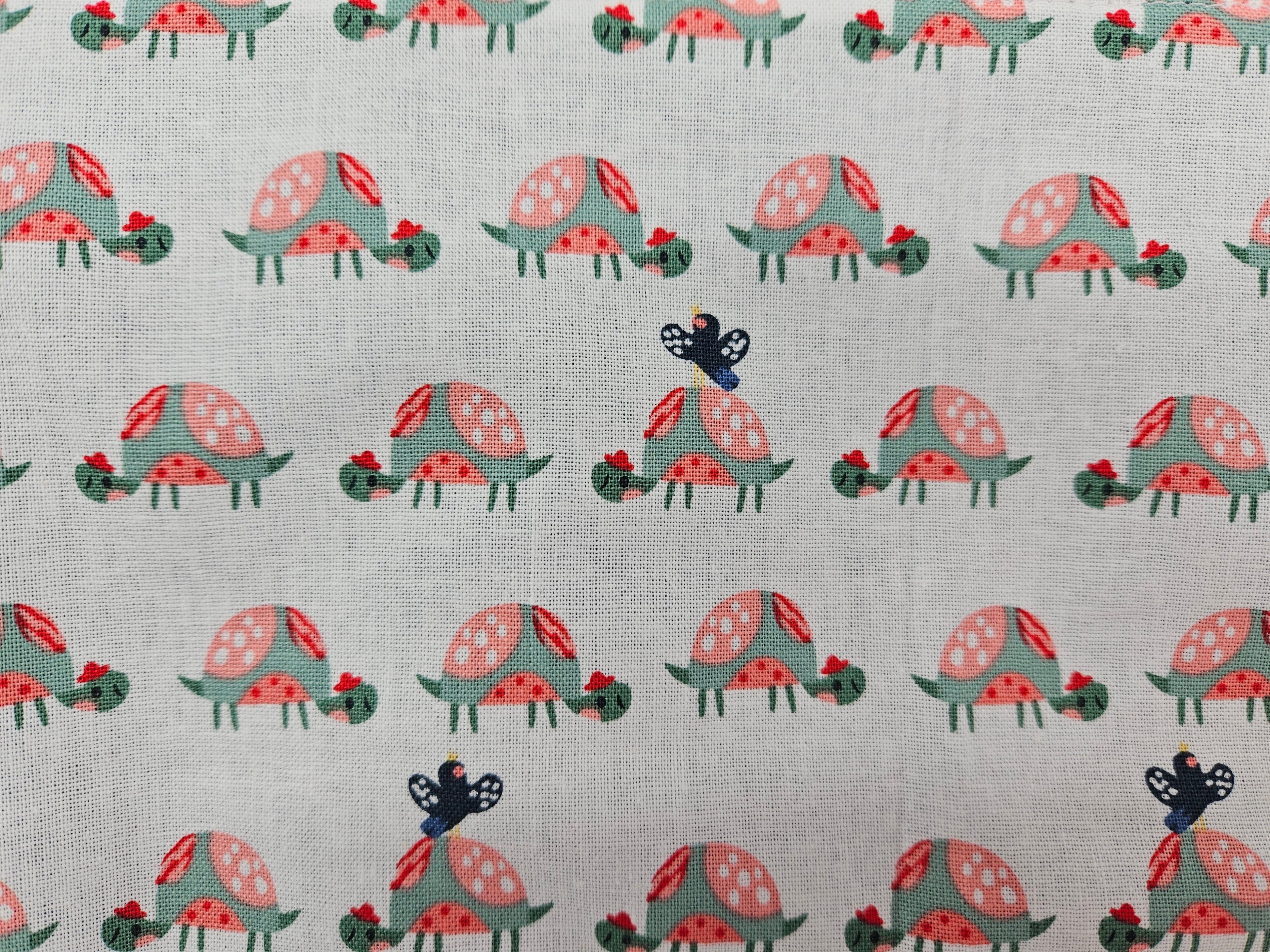 Pattern of cartoon turtles on a textured grey background