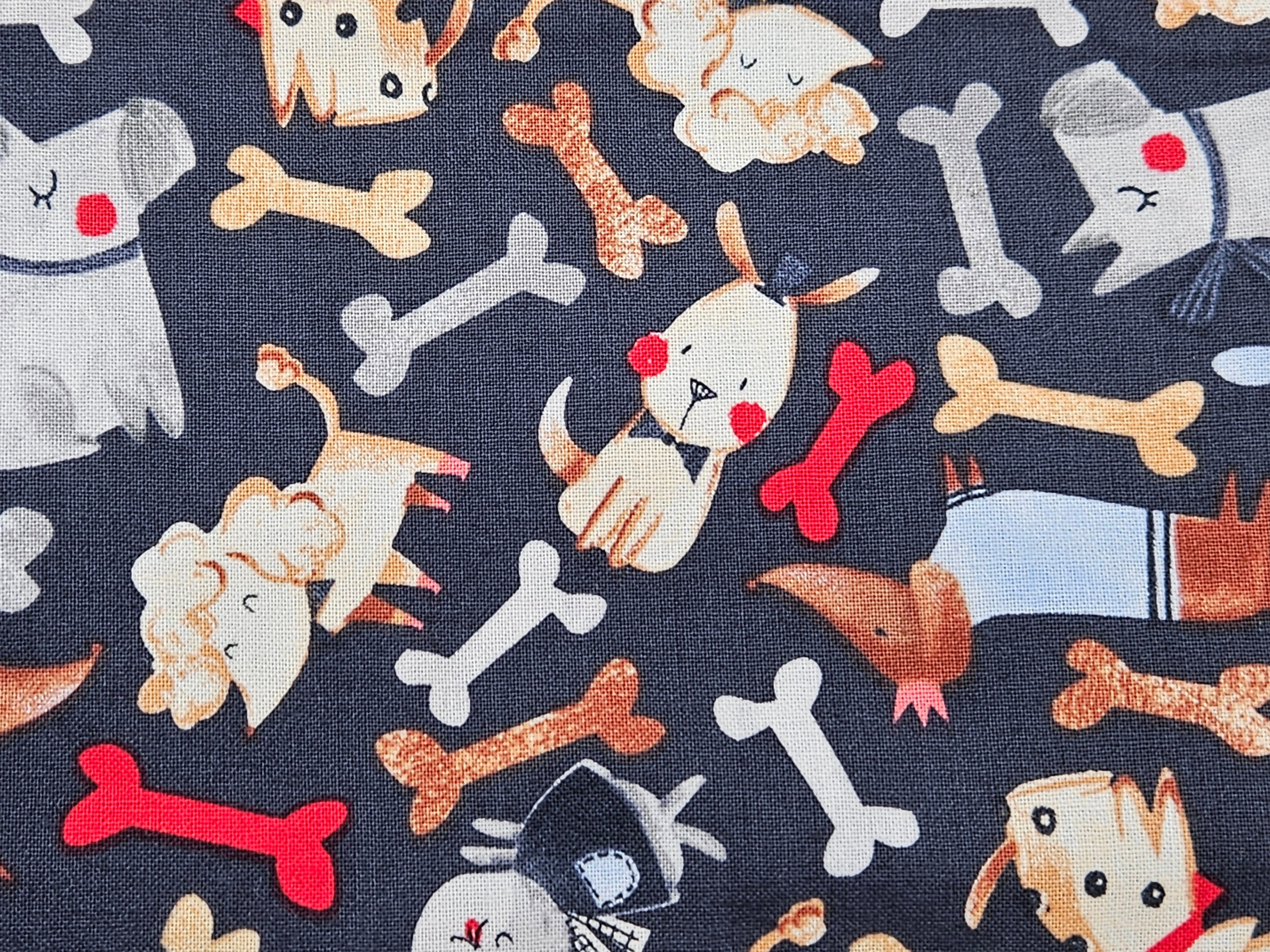 Pattern of cartoon dog and bone pattern on a dark blue background