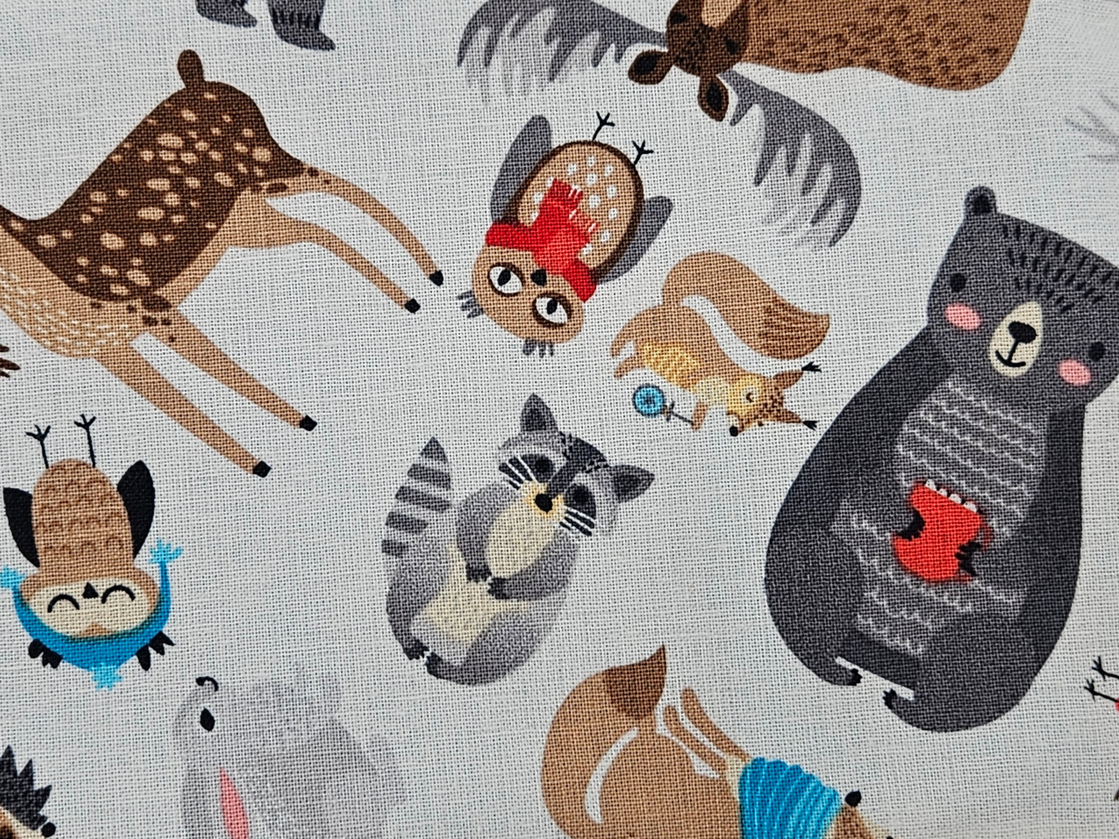 Pattern of cartoon animals on a gray background